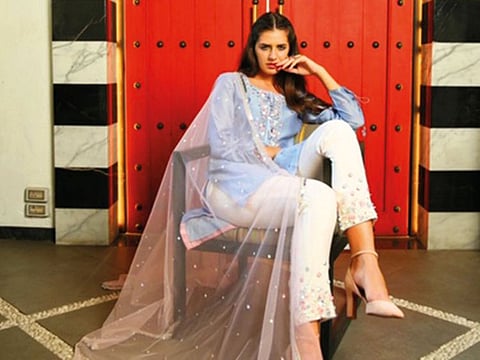 A model wears a creation by Rebecca Dewan.