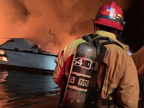 A commercial scuba-dive boat sank amid intense flames early Monday off the coast of Southern California and 34 passengers were unaccounted for, the US Coast Guard said.