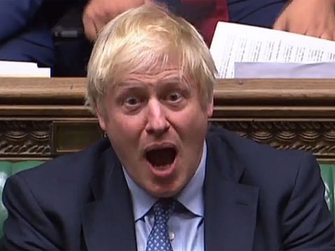 Britain's Prime Minister Boris Johnson reacts to Britain's opposition Labour party leader Jeremy Corbyn.