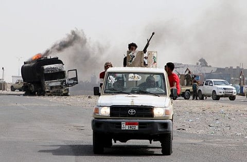 STC fighters patrol a road during clashes with government forces in Aden, Yemen August 29, 2019.