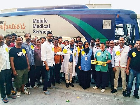 Workers receive free health checks thanks to Dar Al Ber Society in association with Aster Medical Centre