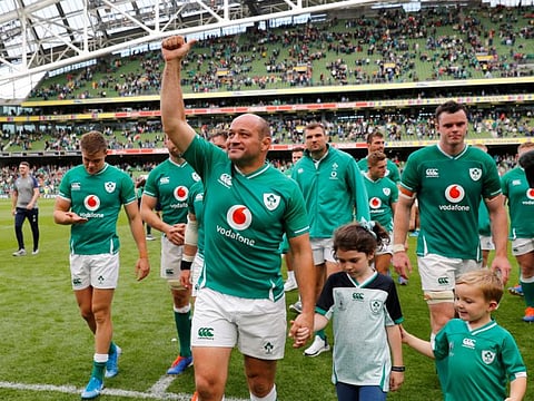 Ireland's Rory Best gestures to the fans as the team leaves the field after a win over Wales.