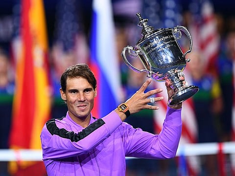 Rafael Nadal holds the trophy after his win over Daniil Medvedev.