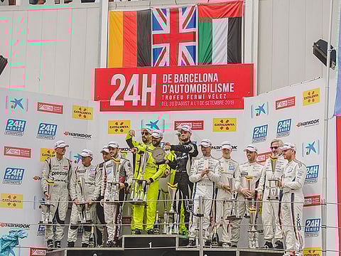GPX Racing on the podium in Barcelona.
