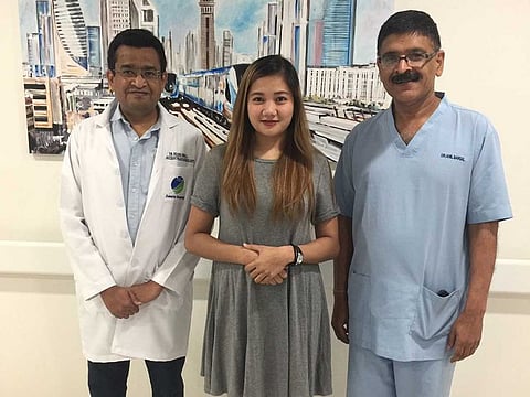 Kathleen with Dr Nilesh and Dr Anil at Zulekha Hospital in Dubai