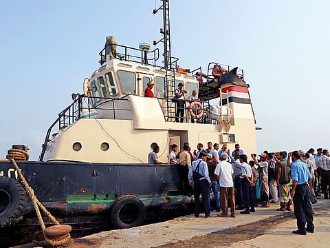 Al Houthi delegates board a tug boat as they head to the meeting. During the two-day talks, the panel also agreed to deploy teams in four sites in Hodeida to monitor the ceasefire.