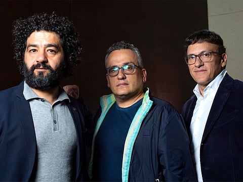 From left: Directors/producers Mohamed Al-Daradji, Joseph Russo and Anthony Russo