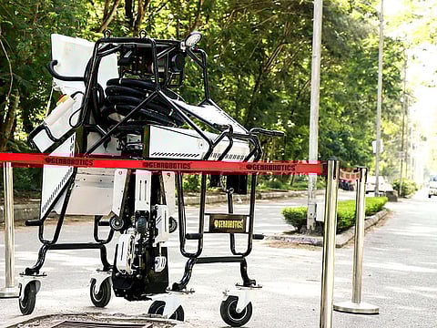 A bit like a giant spider with a bucket, the pneumatic robot can be lowered into a manhole to unblock drains and collect and deposit any debris above ground