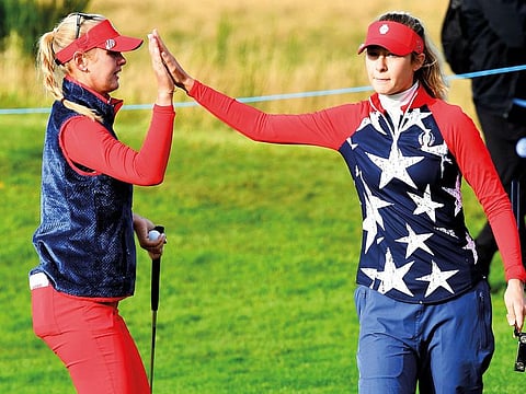 Americans Jessica Korda (left) and Nelly Korda rejoice on the first day of the Solheim Cup golf tournament at Gleneagles, Scotland.