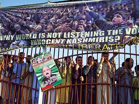 People of Pakistan-administered Kashmir listen to Imran Khan (not pictured) during a rally in Muzaffarabad yesterday. Imran Khan promised to raise Delhi’s decision to strip Indian-administered Kashmir of its autonomy at next week’s UN General Assembly.