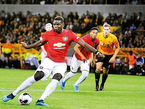 Manchester United’s Paul Pogba in action during the English Premier League match against Wolverhampton Wanderers earlier. Paul Pogba heads a lengthy injury list for United for the visit of in-form Leicester City to Old Trafford today.