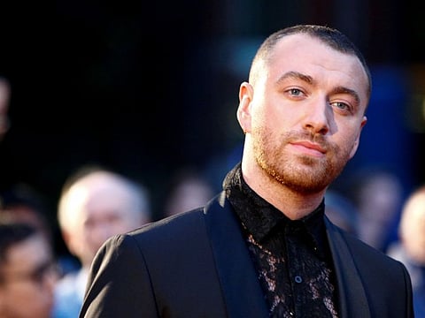 FILE PHOTO: Singer Sam Smith poses as they arrive to the GQ Men Of The Year Awards 2019 in London, Britain September 3, 2019. REUTERS/Henry Nicholls - RC1C1BE53450/File Photo
