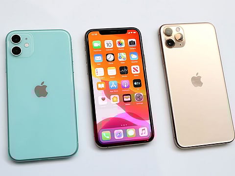 File photo: The new Apple iPhone 11 (L) and iPhone 11 Pro (R) are displayed during an Apple special event on September 10, 2019 in Cupertino, California.