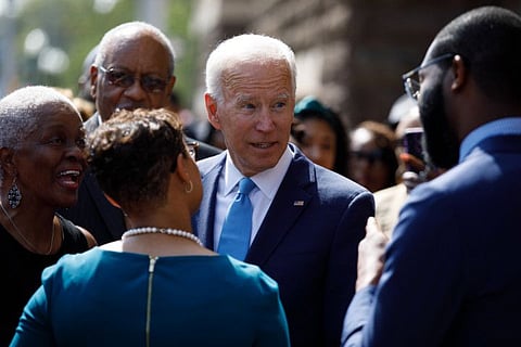 Joe Biden, a Democratic presidential hopeful, greets attendees at the 16th Street Baptist Church where he spoke for the 56th anniversary of the bombing that took place there.