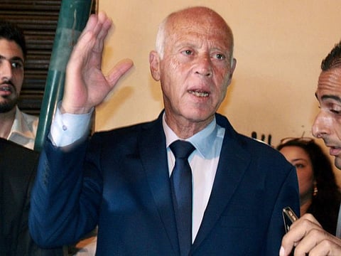 Tunisian presidential candidate Kais Saied speaks to the media at his campaign headquarters in the capital Tunis on September 15, 2019, as exit polls ahead of the preliminary results for the polls predicted him to be "first in the first round".