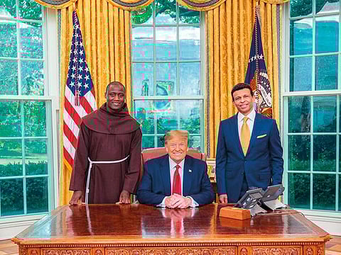 Donald Trump with Peter Tabichi and Sunny Varkey during a meeting at the White House on Monday.