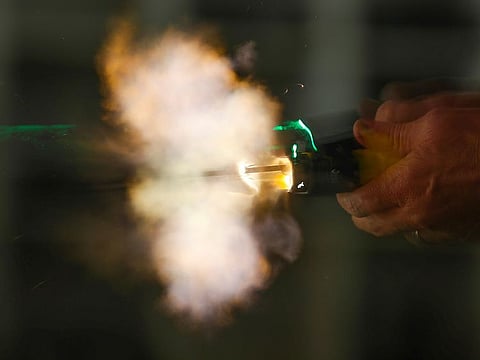 A new non-lethal weapon by BolaWrap, that discharges an 8 foot bola style Kevlar tether at 640 feet per second to entangle a subject at a range of 10-25 feet, is deployed during training in Laguna Niguel, California.