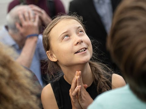 Swedish environmental activist Greta Thunberg takes part in a media event on Capitol Hill on September 17, 2019 in Washington,DC. Thunberg spoke forcefully on September 16, 2019 in Washington,DC about the "destruction" of the planet and the large-scale deaths that could come about as a result of climate change, water and air pollution and the destruction of food chains.