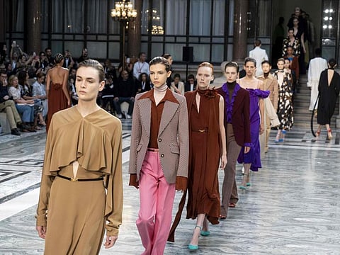 Models present creations from designer Victoria Beckham during a catwalk show for the Spring/Summer 2020 collection on the third day of London Fashion Week in London on September 15, 2019. / AFP / Niklas HALLE'N