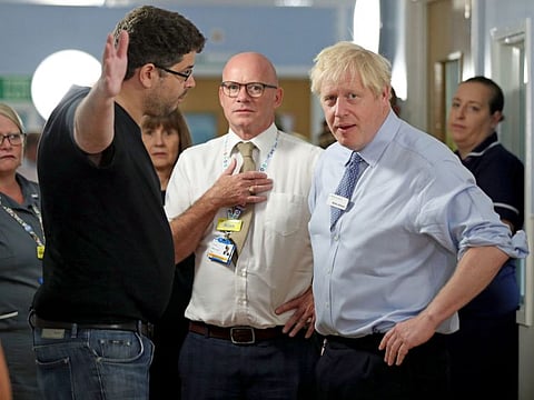 Omar Salem confronted Boris Johnson about the NHS at a hospital in London