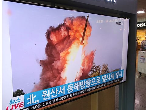 A TV screen shows a file image of a North Korea's missile launch during a news program at the Seoul Railway Station in Seoul, South Korea, Wednesday, Oct. 2, 2019.