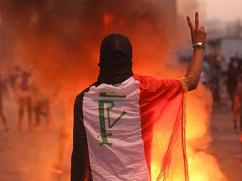 An Iraqi protester gestures during a demonstration against failing public services and unemployment at Tayaran square in Baghdad (File image)