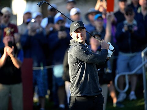 Brooks Koepka watches his tee shot on the 10th hole during the Shriners Hospitals for Children Open golf tournament at TPC Summerlin in Las Vegas, on Thursday.
