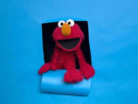 Elmo of the film "Being Elmo" poses for a portrait in the Fender Music Lodge during the 2011 Sundance Film Festival on Monday, Jan. 24, 2011 in Park City, Utah. (AP Photo/Victoria Will)