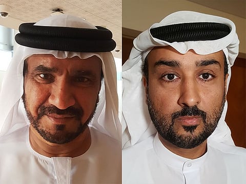 Emirati voters Mohammed Al Muhairi (left) and Abdulla Mubarak