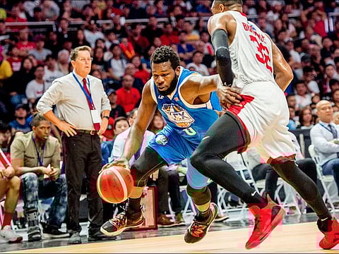 Action from the match between the San Miguel Beermen and NLEX at the Coca-Cola Arena in Dubai.