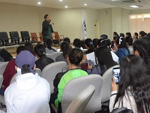 Philippine Consul-General Paul Raymund Cortes addressing the 158 repatriates from the UAE on Sunday as part of the one-country team approach by the Department of Foreign Affairs and the Inter-Agency Council Against Trafficking (IACAT) to combact trafficking.