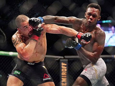 Robert Whittaker of Australia, left, will take on Darren Till in Abu Dhabi