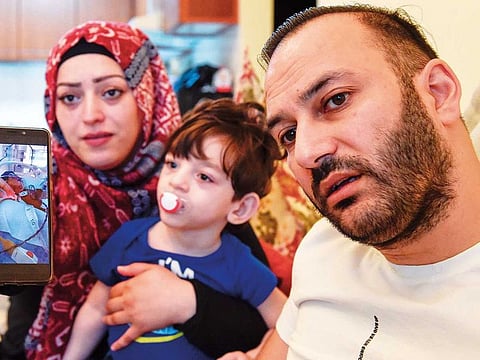 Daayim Fazili with his wife Camellia and son Omar in their Ajman home. An investigation by Dubai Health Authority found that a multi-specialty hospital failed to detect fetal distress during delivery causing severe damage to Omar’s brain.