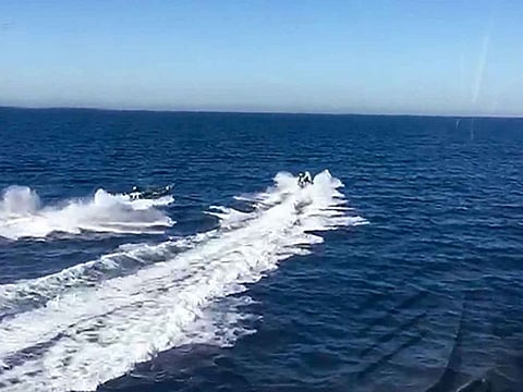 This handout picture released by the Spanish Guardia Civil on October 4, 2019 shows a police high-speed chase with drug-smugglers, off the coast of Mijas, Malaga, southern Spain.