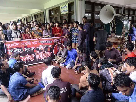 Bangladeshi students of Dhaka University take part in a protest in Dhaka on October 7, 2019. Hundreds of students staged protests in Bangladesh universities after a pupil was allegedly beaten to death by activists of the ruling party hours after he criticised Prime Minister Sheikh Hasina's water sharing deal with India