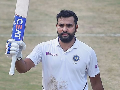 India's Rohit Sharma celebrates his century on the fourth day of the first cricket test match against South Africa, at Dr YS Rajasekhara Reddy ACA-VDCA Cricket Stadium, in Visakhapatnam, October 5, 2019.
