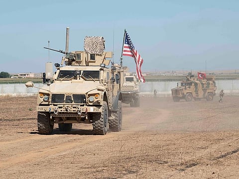 U.S. and Turkish military forces conduct a joint ground patrol inside the security mechanism area in northeast, Syria, September 8, 2019. Picture taken September 8, 2019.