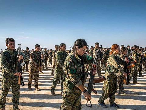 Kurdish fighters with the Syrian Democratic Forces in Hukumya, Syria, on October 11, 2017.