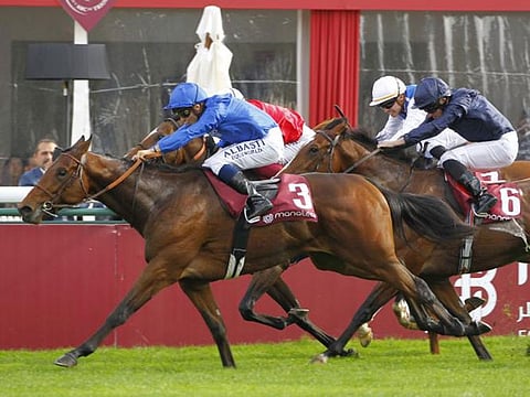 Godolphin's Victor Ludorum (in blue) gave veteran handler Andre Fabre his eighth career win in the French 2000 Guineas.