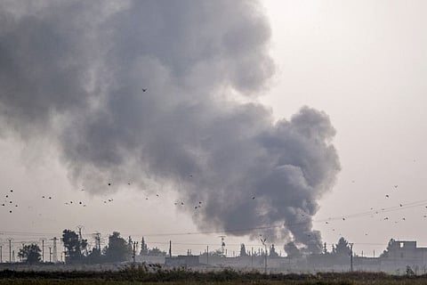 Smoke rises from the Syrian town of Tal Abyad after Turkish bombings, in a picture taken from the Turkish side of the border near Akcakale in the Sanliurfa province on October 9, 2019. Turkey launched an assault on Kurdish forces in northern Syria on October 9 with air strikes and artillery fire reported along the border.