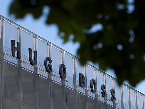File photo: The Hugo Boss logo is seen on a store in Metzingen, Germany.