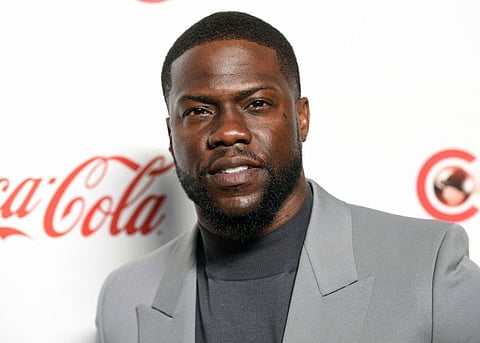 FILE - In this April 4, 2019 file photo, Kevin Hart poses for photos at the Big Screen Achievement Awards at Caesars Palace in Las Vegas. Hart has been injured in a car crash in the hills above Malibu on Sunday, Sept. 1. (Photo by Chris Pizzello/Invision/AP, File)