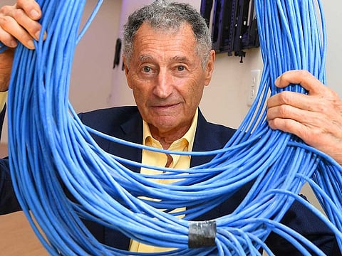 Dr. Leonard Kleinrock poses in his new lab under construction at the University of California Los Angeles.
