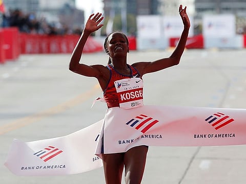 Brigid Kosgei wins the Chicago Marathon in world record time.