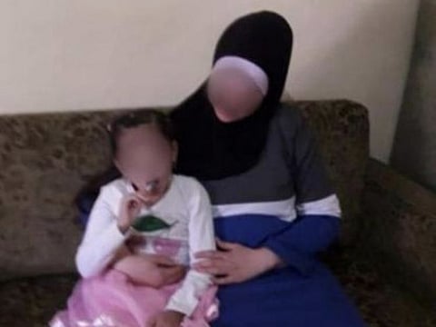 Image from police of mom and daughter.