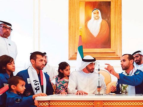 Shaikh Mohammad Bin Zayed meets Hazzaa AlMansoori and Sultan Al Neyadi.