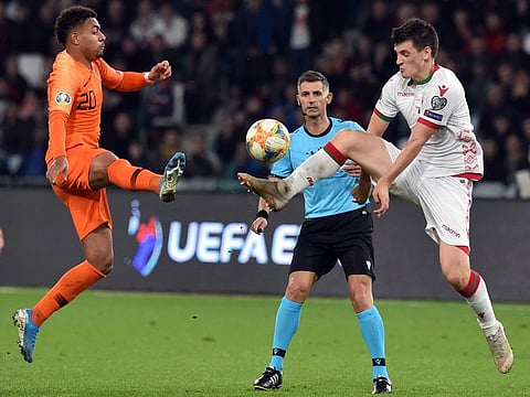 Action between The Netherlands and Belarus during their Euro 2000 qualifier on Sunday.