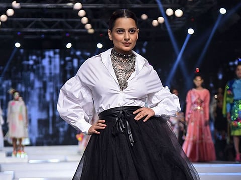 New Delhi: Kangana walks the ramp during grand finale of the India Fashion Week in New Delhi, Saturday night, Oct. 12, 2019. (PTI Photo) (PTI10_13_2019_000052B)