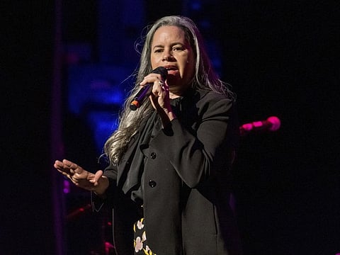 FILE - This Dec. 8, 2018 file photo shows Natalie Merchant performing at Cyndi Lauper's 8th Annual "Home for the Holidays" benefit concert in New York. Merchant is the sixth recipient of the John Lennon Real Love Award, and will headline a tribute concert to the former Beatle in New York on Dec. 6. She's also getting an award from ASCAP this month. (Photo by Charles Sykes/Invision/AP, File)