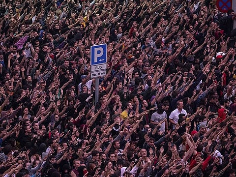 Pro-independence protesters gather during a demonstration at El Prat airport, outskirts of Barcelona, Spain